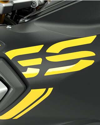 We see the GS lettering and the tape design on the black tank.